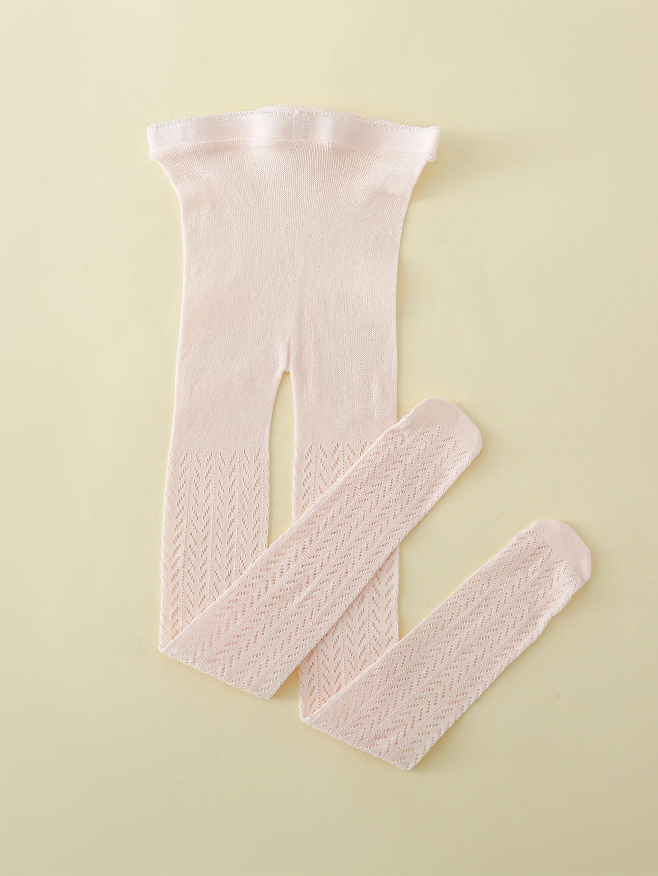 "Collants en maille fine et coton avec motif de poisson"