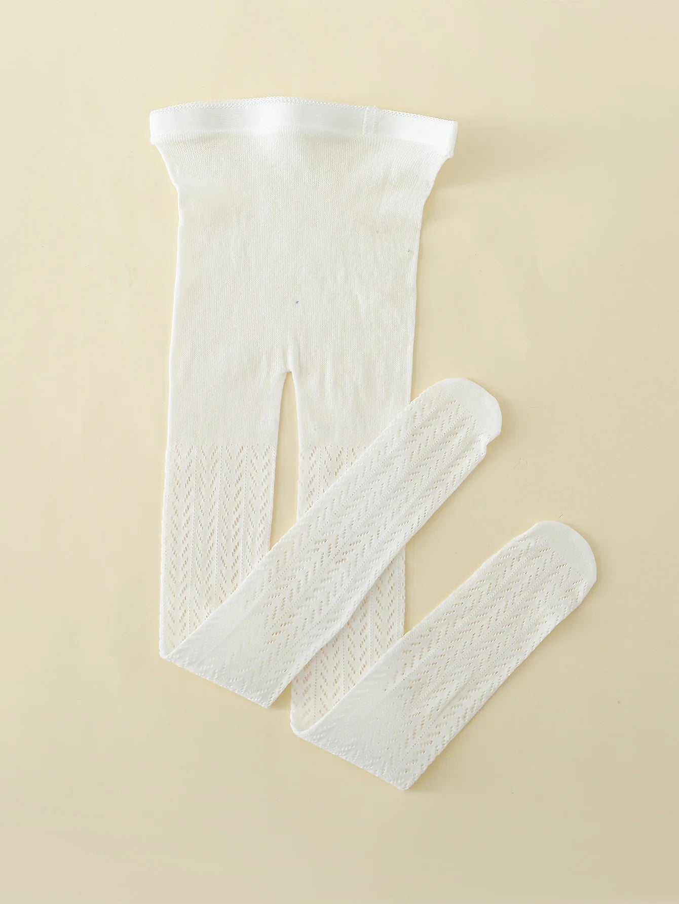 "Collants en maille fine et coton avec motif de poisson"