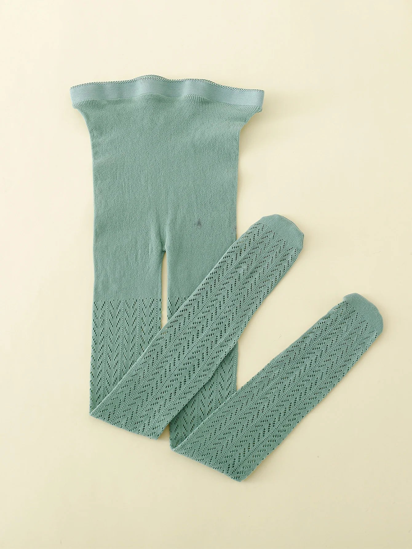 "Collants en maille fine et coton avec motif de poisson"