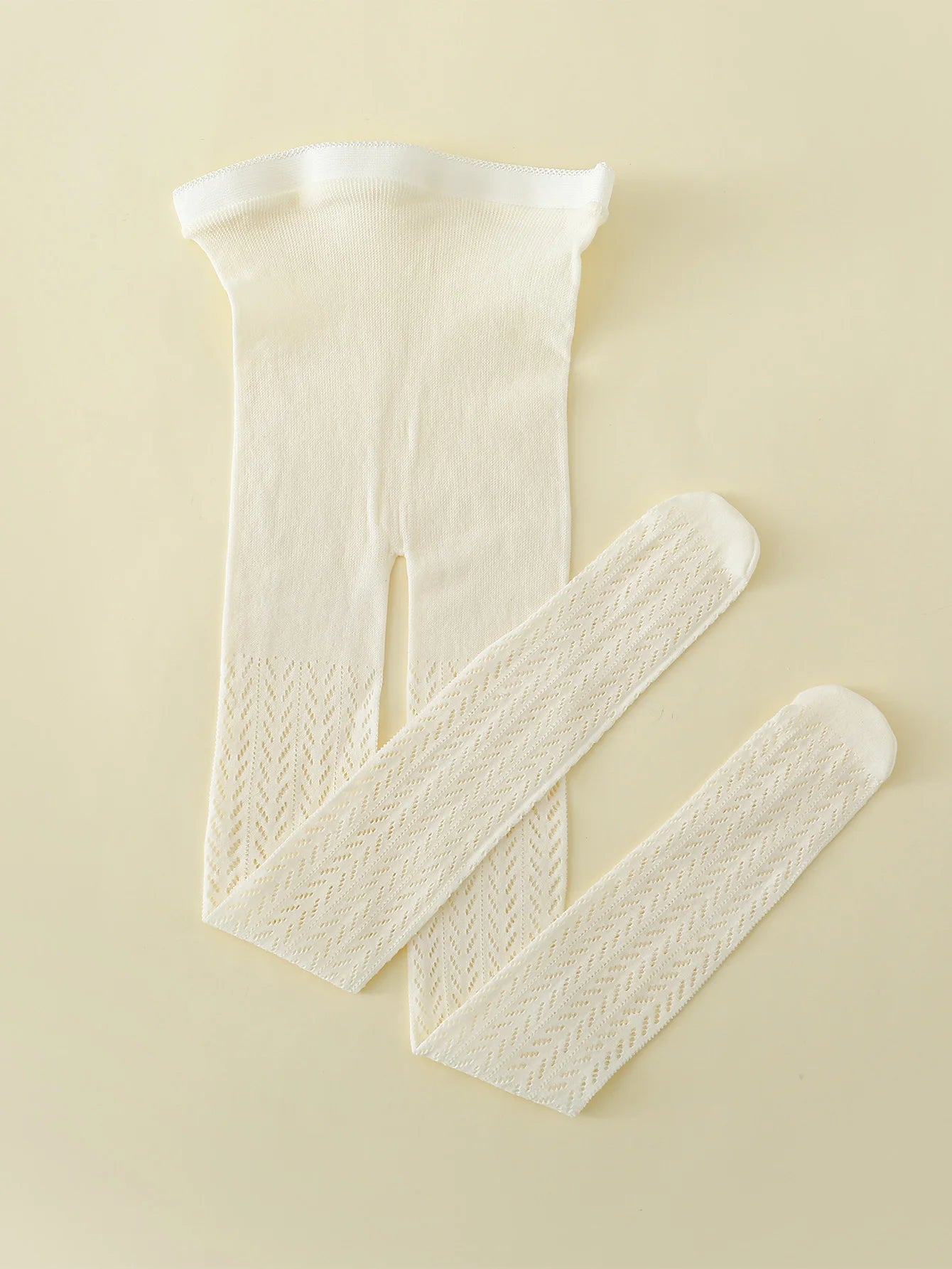 "Collants en maille fine et coton avec motif de poisson"